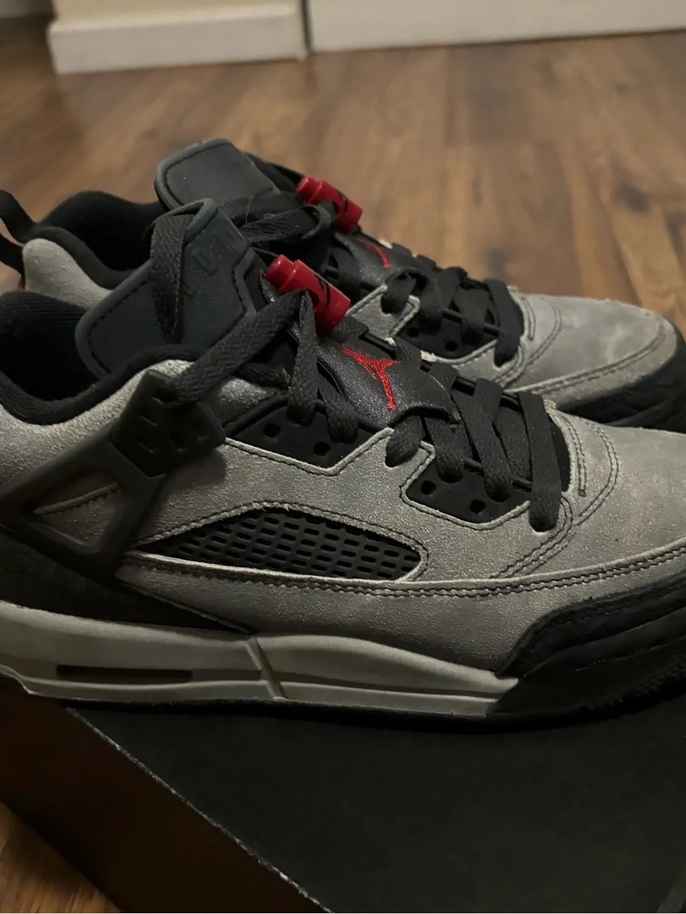 Jordan Grey and Black Sneakers with Red Jumpman Accents